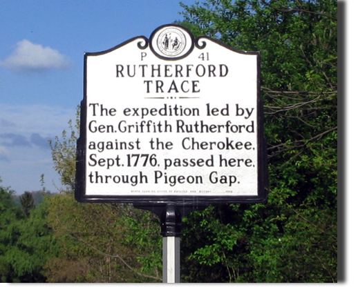 RUTHERFORD TRACE:

The Rutherford Trace march proceeded through Bethel and beyond in 1776. General Griffith Rutherford and his more than two thousand troops conducted a scorched earth progression against thirty-six Cherokee villages in order to eradicate Cherokee resistance to white settlement in the area.  A state historic marker commemorates the historic trek on Highway #276 across Waynesville Mountain.